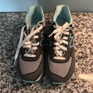 New Balance Black and White Sneakers with Light Blue Accents